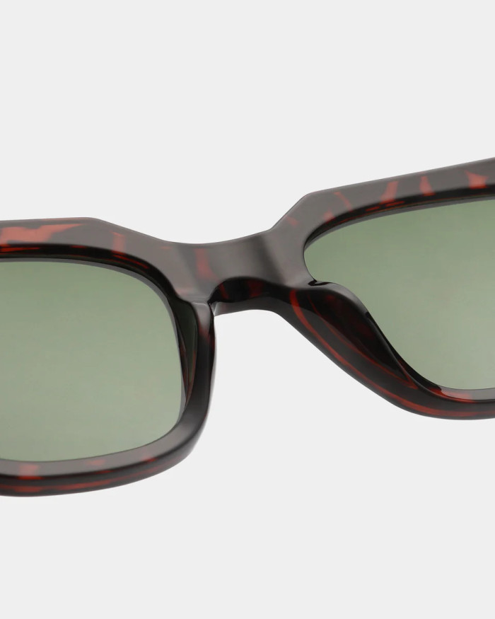 A. Kjaerbede Kaws Demi Tortoise Sunglasses
