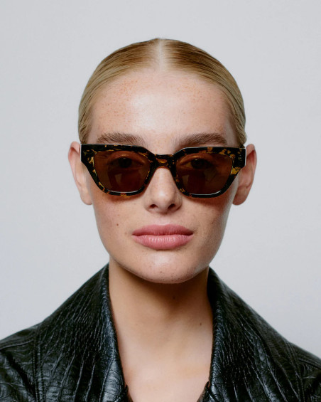 A. Kjaerbede Kaws Black / Yellow Tortoise Sunglasses