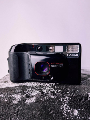 Canon Top Shot – compact analog camera with 38mm f/2.8 lens.